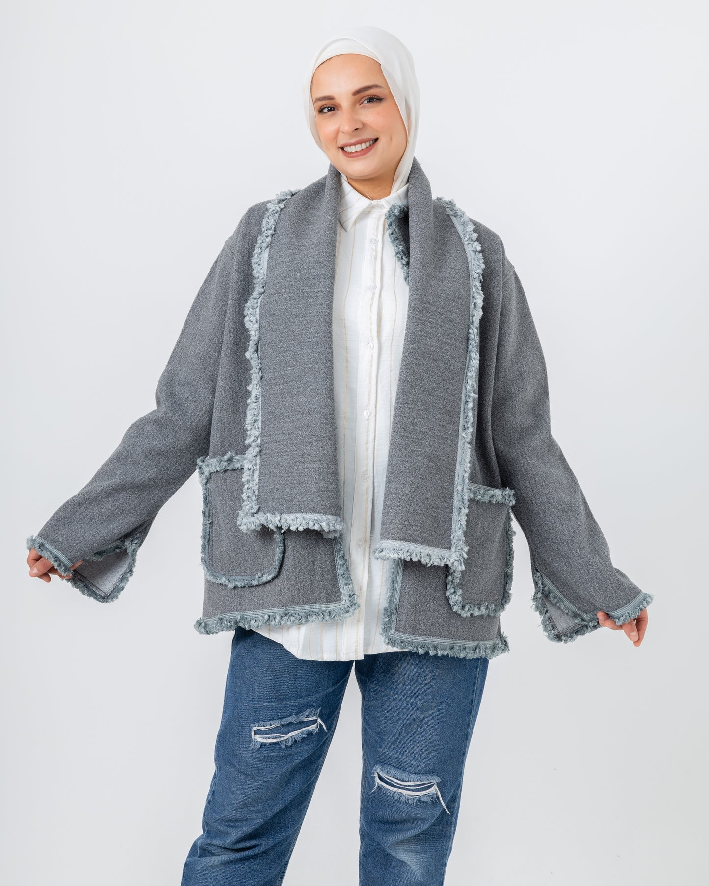 Jacket with a fringed scarf