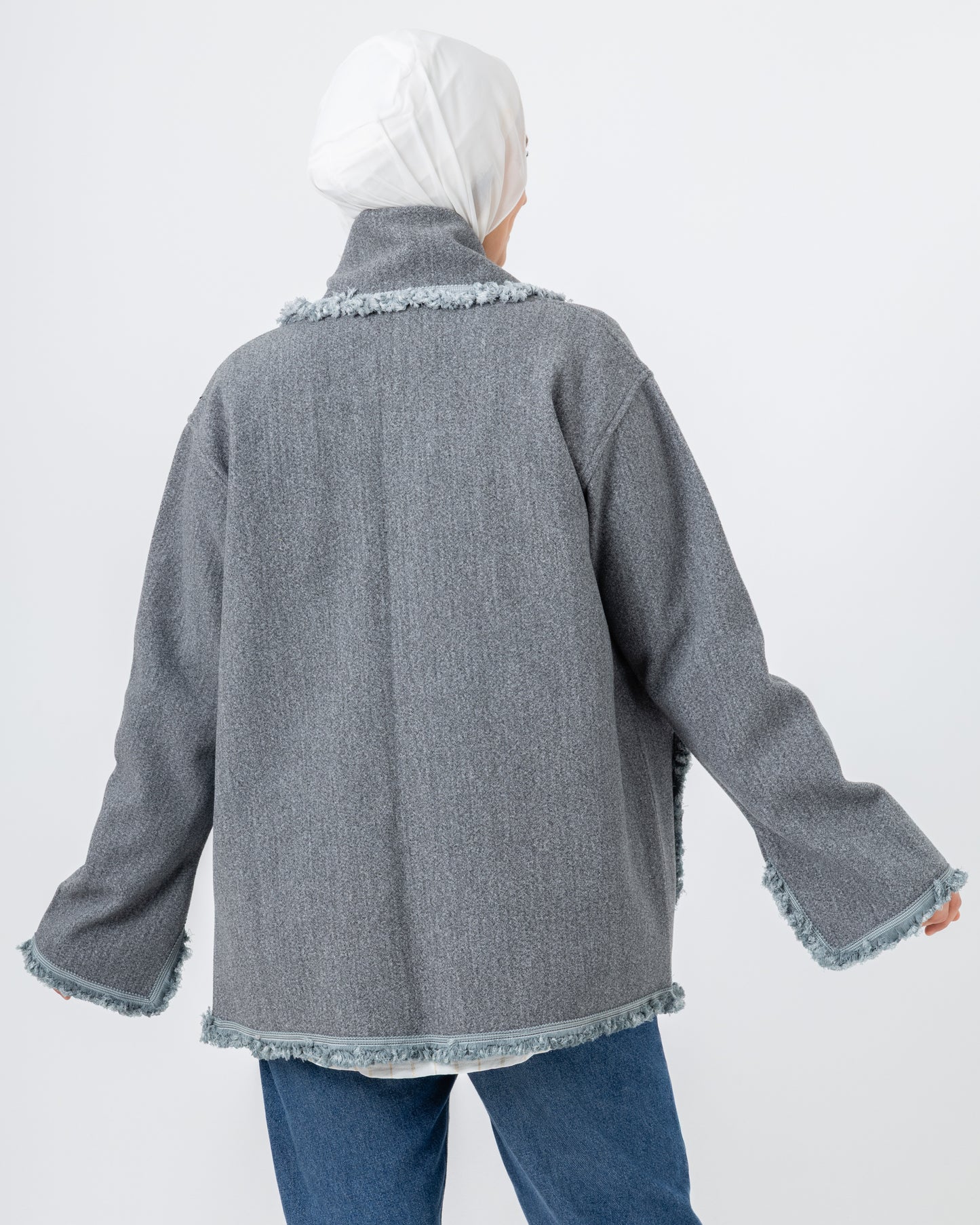 Jacket with a fringed scarf