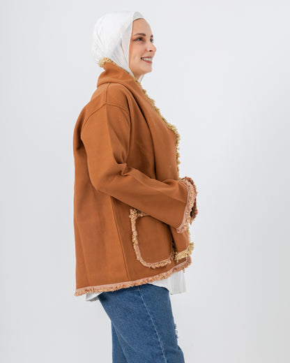 Jacket with a fringed scarf